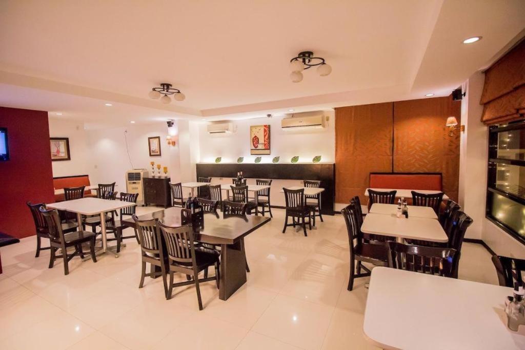 The Red Palm Suites And Restaurant Butuan City Dış mekan fotoğraf